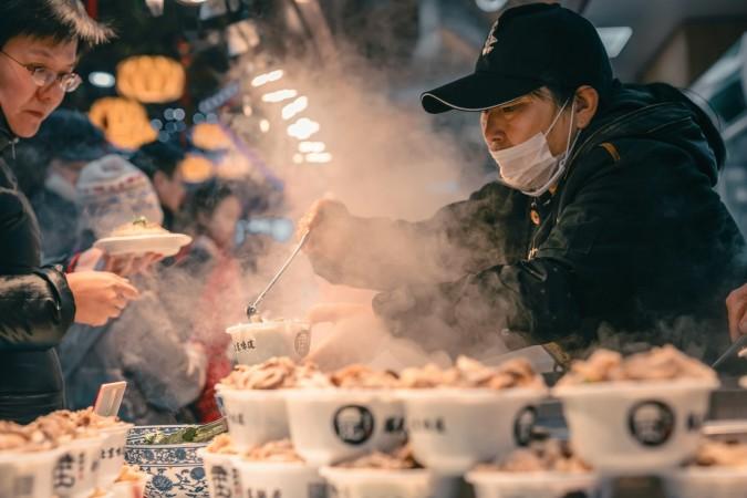 A Noodle Vendor in Beijing