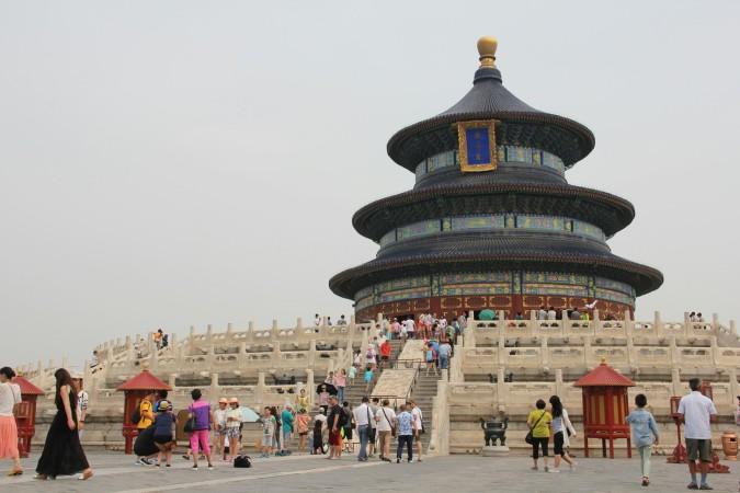Tourists visit the Temple of Heaven in Beijing