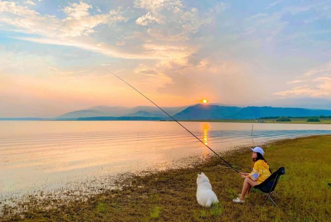 Experience camping and fishing at Dau Tieng Lake after your boat tours