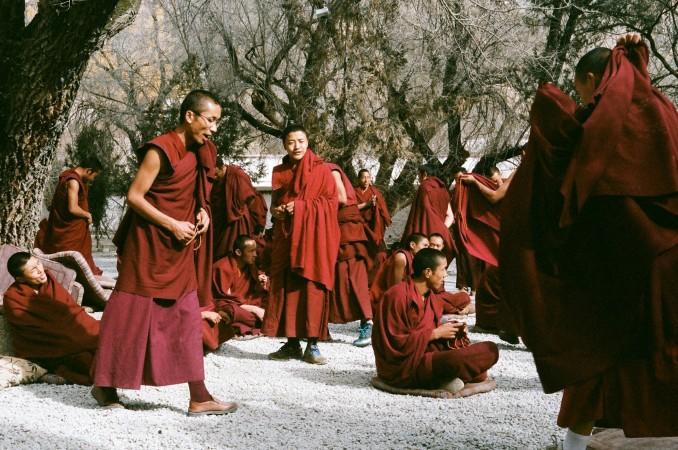 Tibetan monks in Lhasa before a debate session - © Will Pagel