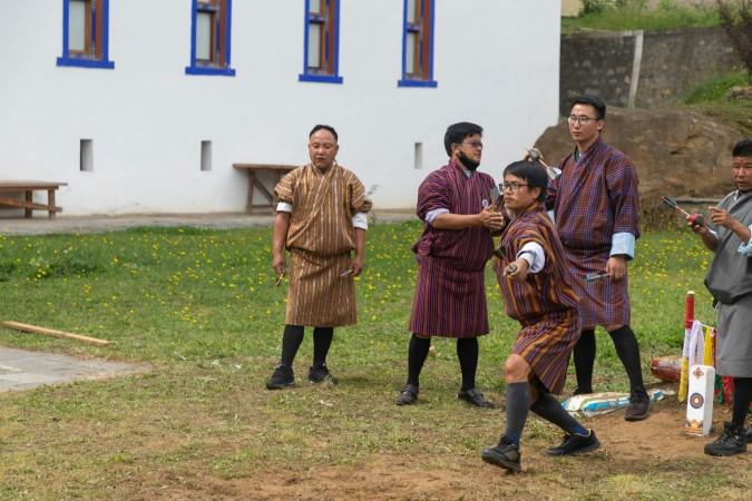 Experience Bhutanese sports like shooting khuru