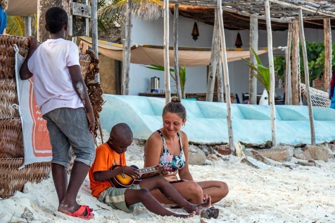Relax with the locals on Zanzibar beach - © Majkl Velner