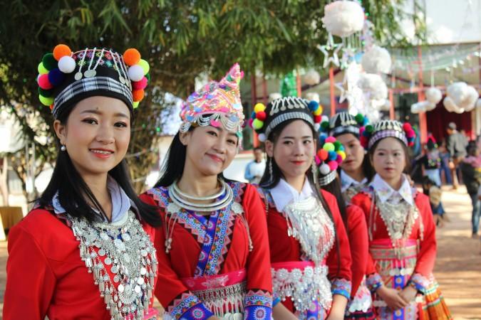 Hmong girls celebrate Hmong New Year Festival by Life on the road