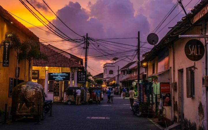 Vibrant color of Galle's street at night - © CafeBiz